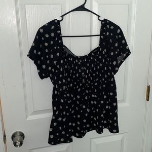 A black floral blouse